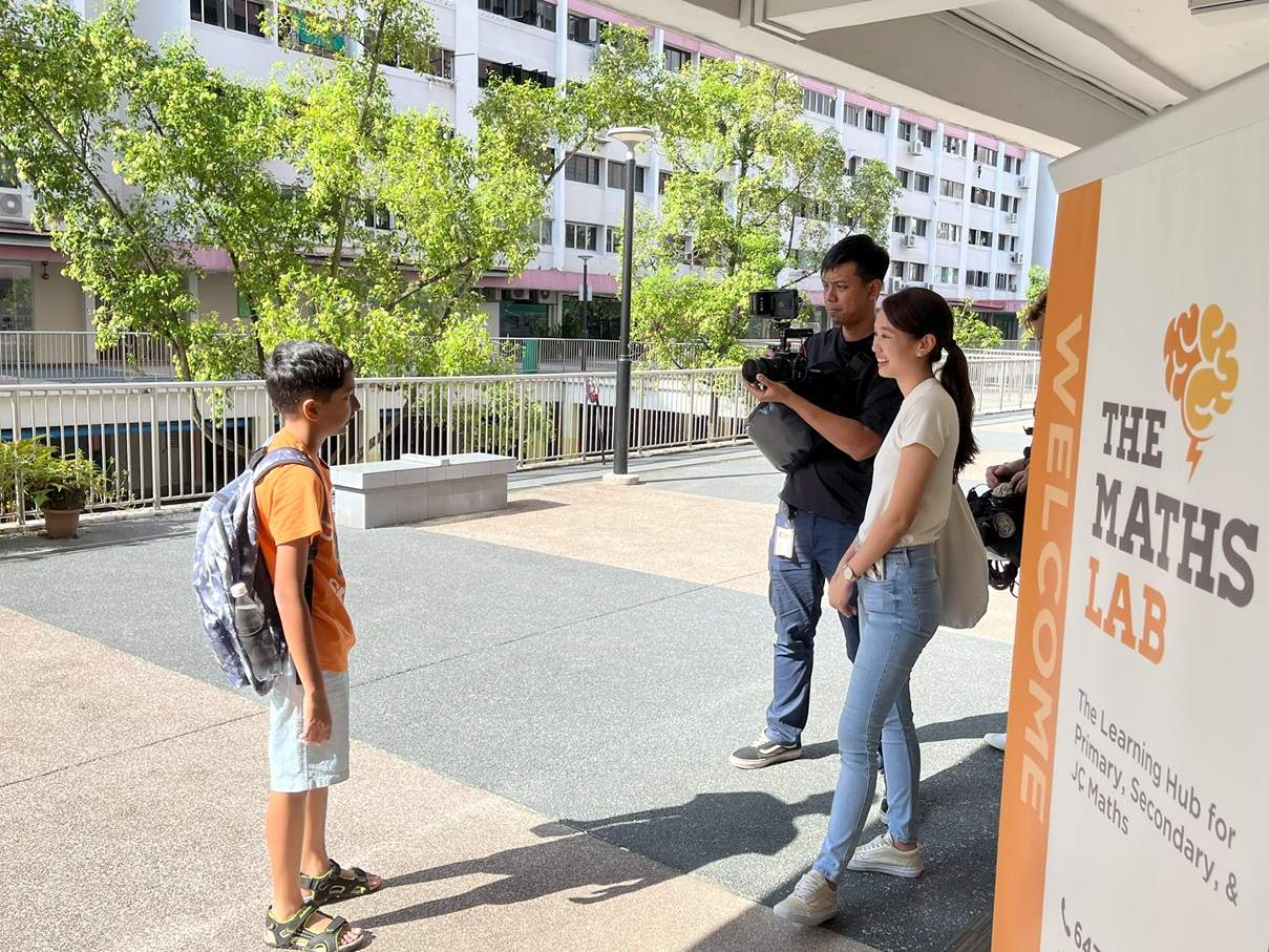 A student being interviewed by Channel News Asia team team.